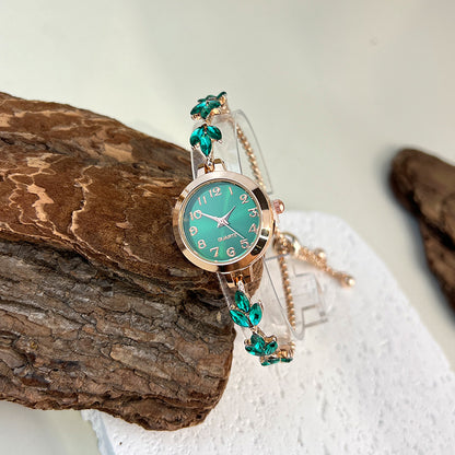 Elegant Ladies Quartz Watch, Round Alloy Case, Arabic Numeral Dial, Leaf-Shaped Diamond-Studded Bracelet
