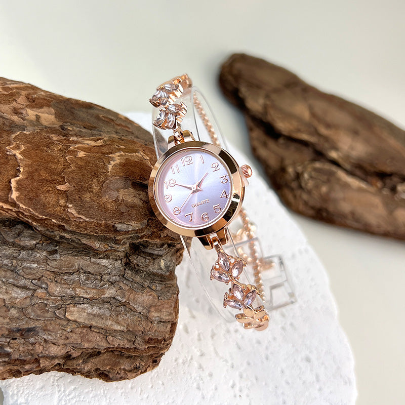 Elegant Ladies Quartz Watch, Round Alloy Case, Arabic Numeral Dial, Leaf-Shaped Diamond-Studded Bracelet