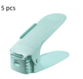5 green shoe racks