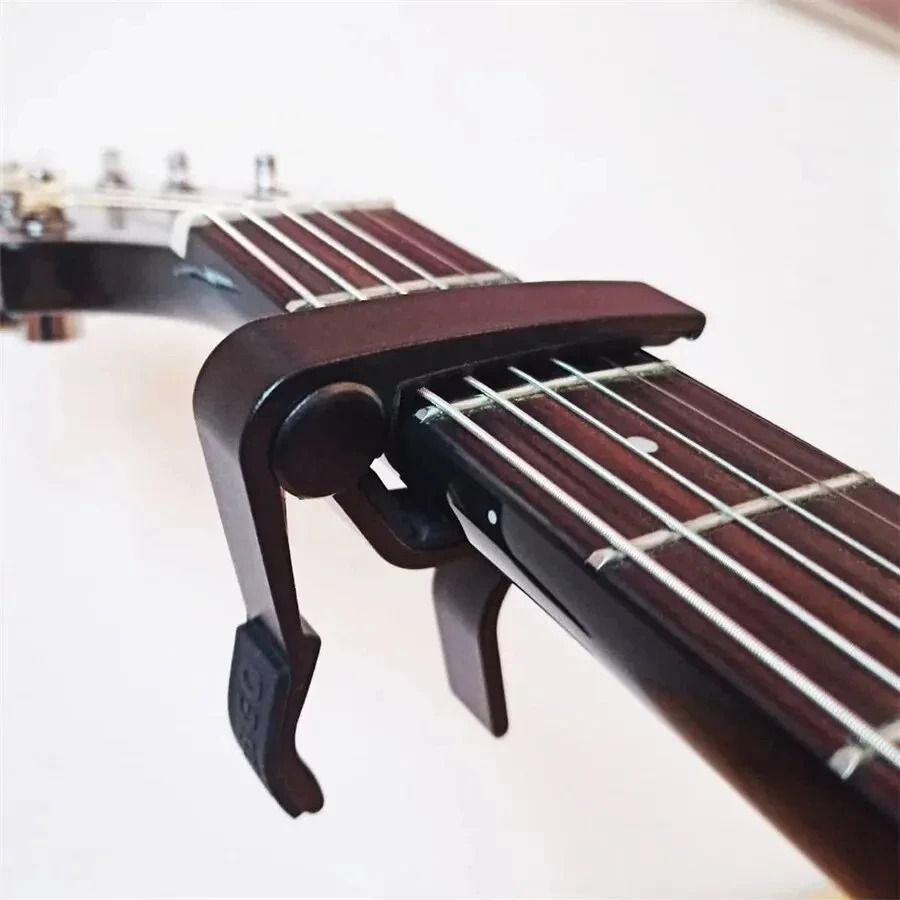 7 Piece Guitar Capo Set with 5 Picks and 1 Holder