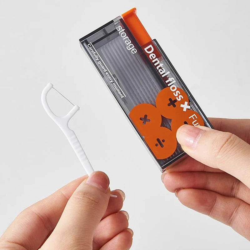 Portable Floss Dispenser with Disposable Flossing Sticks